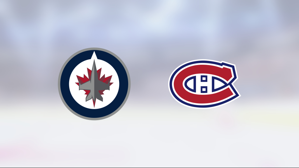 Jets beat Canadiens in overtime